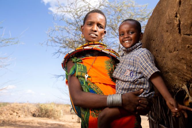 A mother and son are pictured at the village. Male children of the Umoja women are allowed to live in Umoja until they turn 18.
