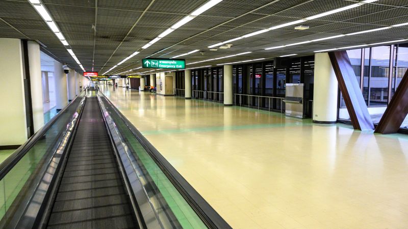 NextImg:Woman's leg amputated after becoming trapped in Thai airport moving walkway | CNN