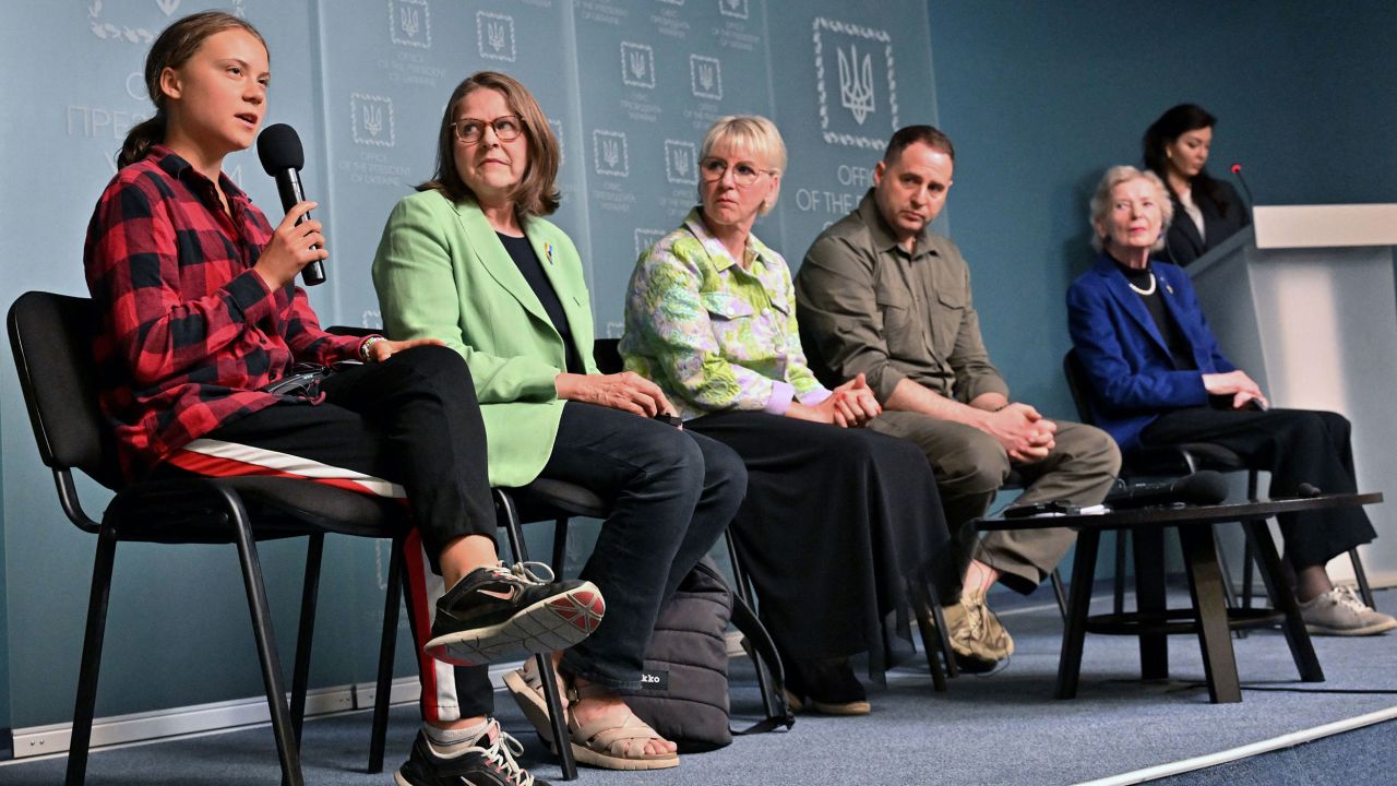 Swedish environmental activist Greta Thunberg, left, and other prominent international and Ukrainian figures attend a press briefing in Kyiv on June 29, 2023. 