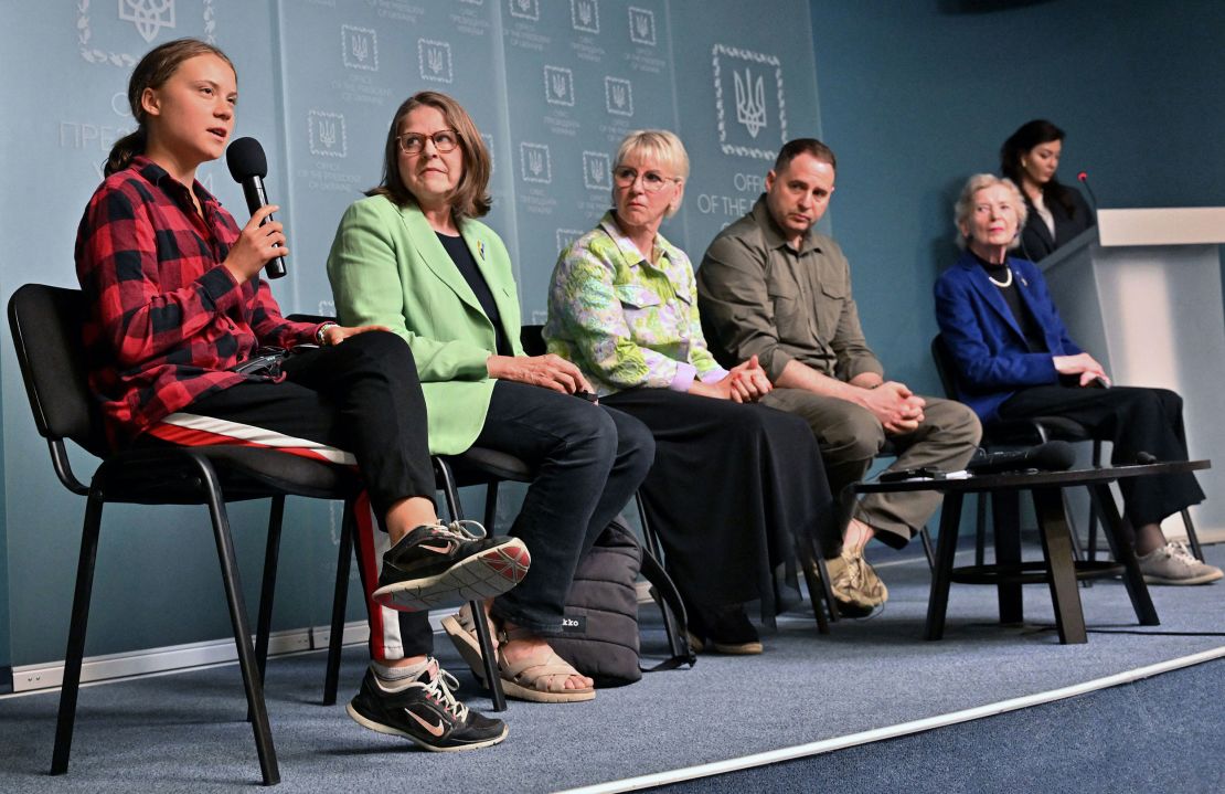 Swedish environmental activist Greta Thunberg, left, and other prominent international and Ukrainian figures attend a press briefing in Kyiv on June 29, 2023. 