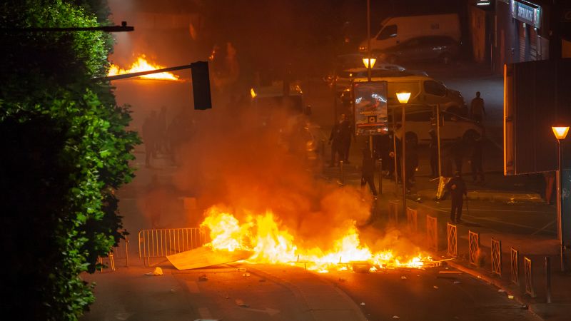 NextImg:'I blame one person,' mother of teen killed by police says as hundreds arrested in fresh violence across France | CNN
