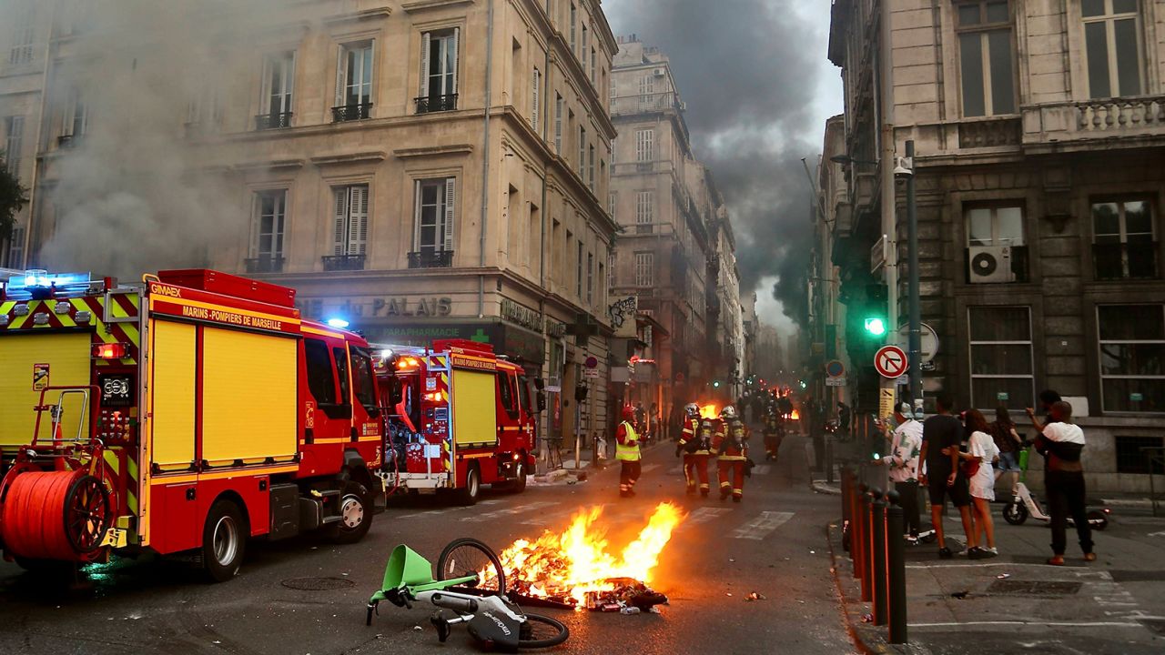 Night of Unrest - Amidst the chaos and fury, a surge of youthful rebellion engulfs the streets, leaving behind shattered windows, looted stores, and a trail of defiance. Au milieu du chaos et de la fureur, une vague de rebellion a submerge les rues, laissant derriere elle des vitrines brisees, des magasins pilles et une trainee de defiance. Marseille, FRANCE-30/06/2023//MUNSCHFREDERIC_Sipa.11368/Credit:Alexis JUMEAU/SIPA/2306300853 (Sipa via AP Images)