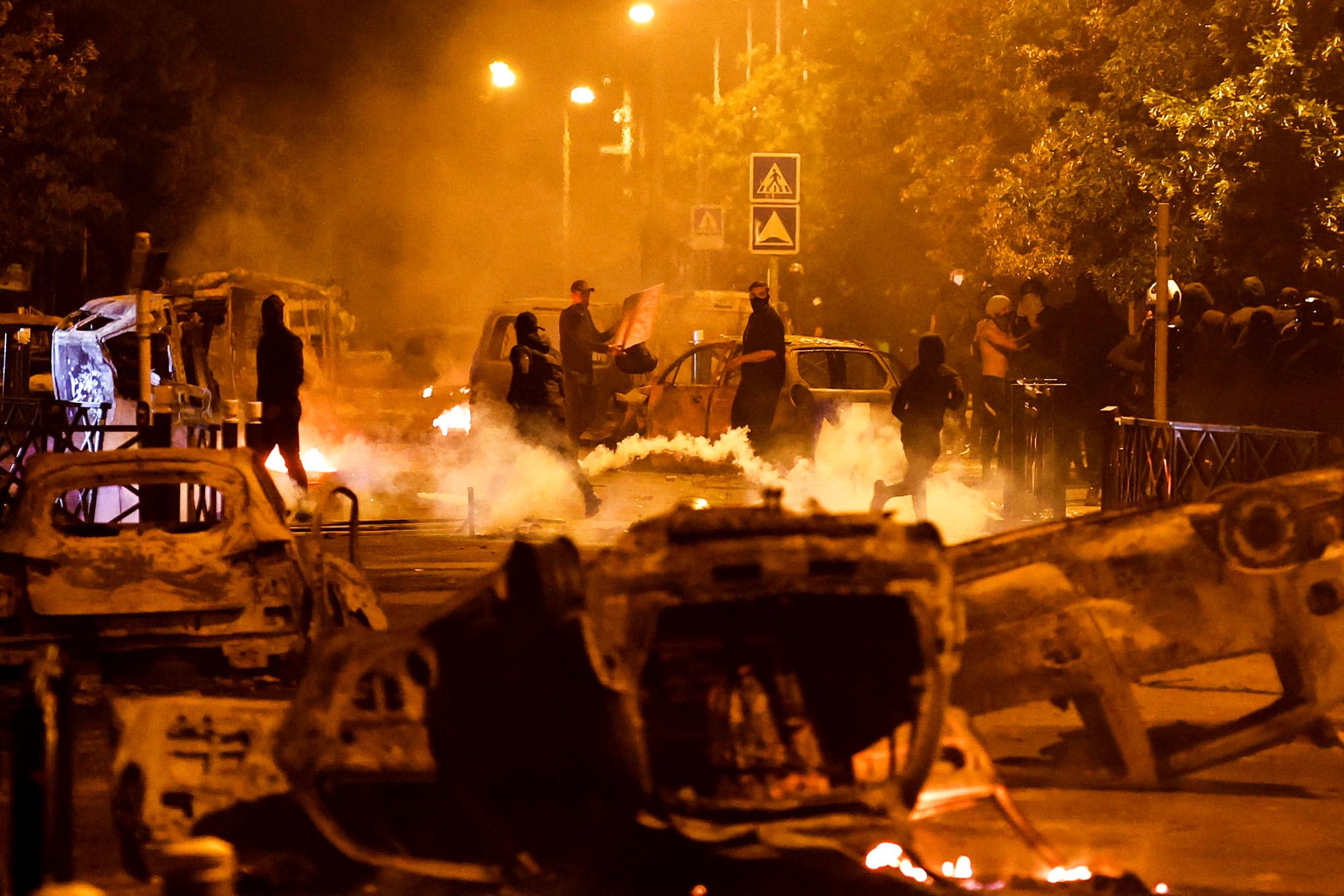 Protesters clash with police in Nanterre on Friday, June 30.