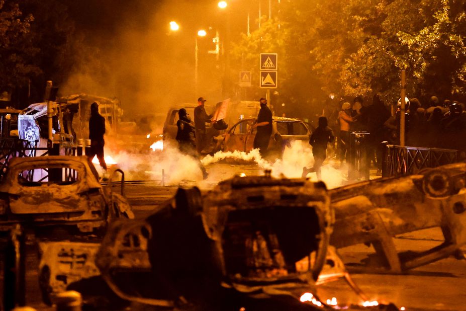 Protesters clash with police in Nanterre on Friday, June 30.