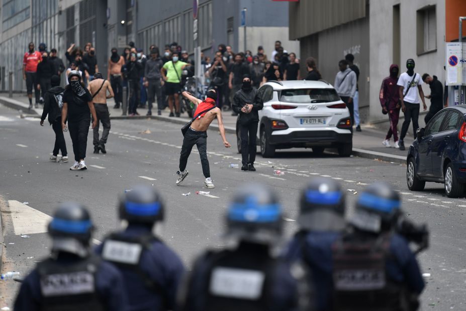 Demonstrators clash with police in Paris on June 29.