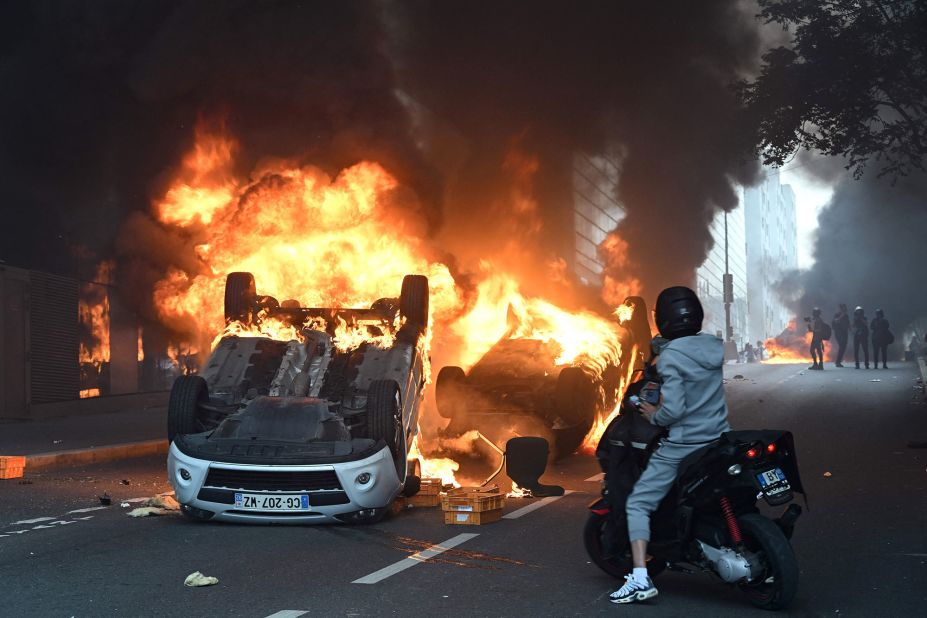 Cars burn in Nanterre on June 29.