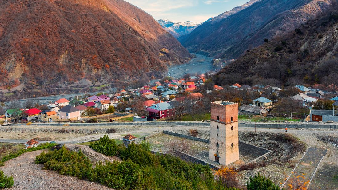 <strong>Sumug Tower:</strong> This two-toned tower, made from stone and brick, stands proudly at the base of the Caucasus Mountains near the charming northwestern village of Ilisu. 