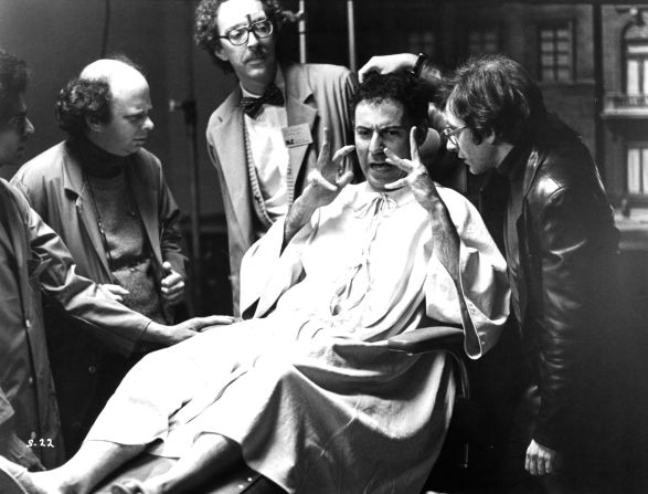 From left, actors Wallace Shawn, William Finley, Arkin and Austin Pendleton are seen on the set of the 1980 film "Simon."