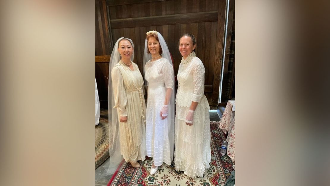 A wedding dress restorer displays more than 150 years of history