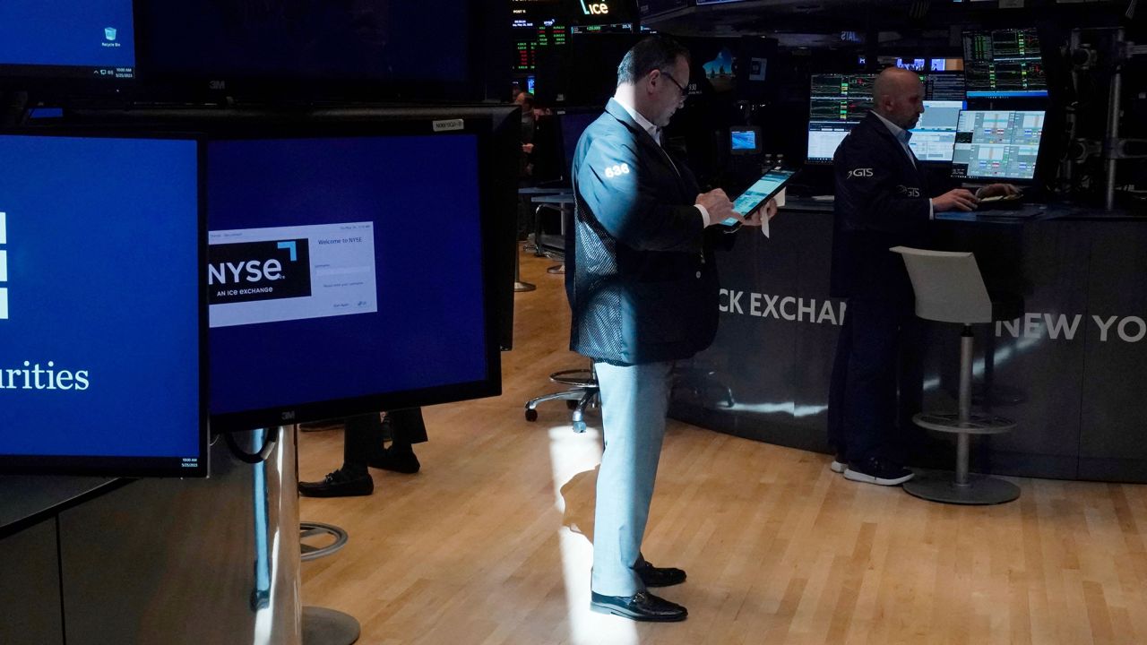 Traders work the floor of the New York Stock Exchange on May 25, 2023.