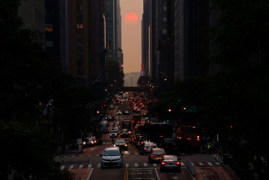 The setting sun is shrouded by smoke from Canadian wildfires in this photo taken from New York's 42nd Street on Thursday, June 29.