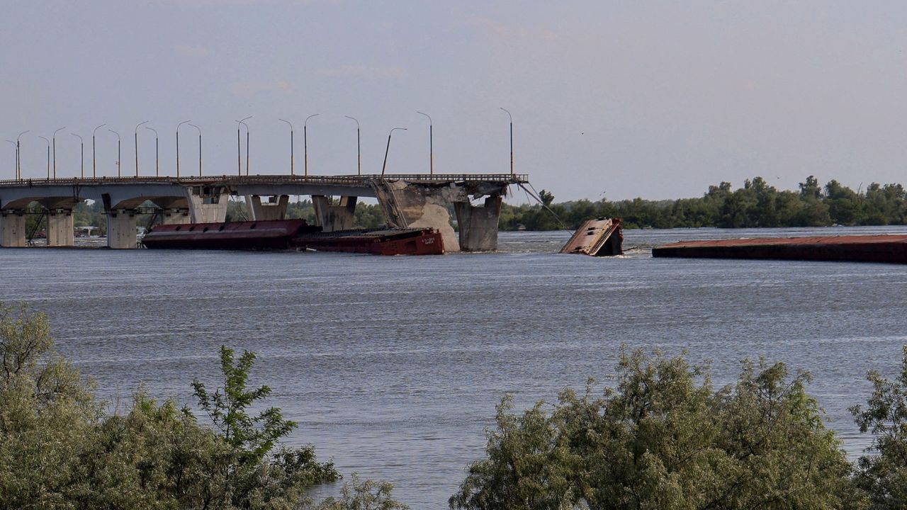 Destroyed Antonivskyi bridge is seen over the flooded Dnipro river after the Nova Kakhovka dam breached, amid Russia's attack on Ukraine, near Kherson, Ukraine June 8, 2023. REUTERS/Stringer