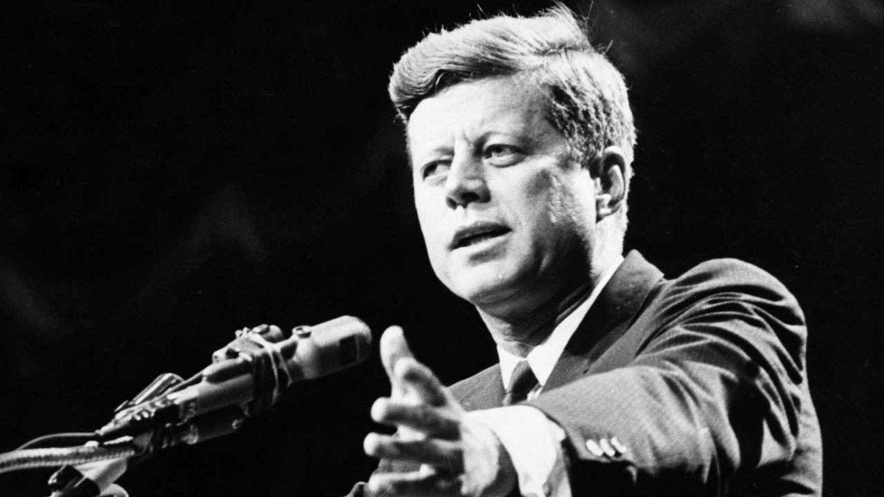 1962:  US statesman John F Kennedy, 35th president of the USA, making a speech.  (Photo by Central Press/Getty Images)