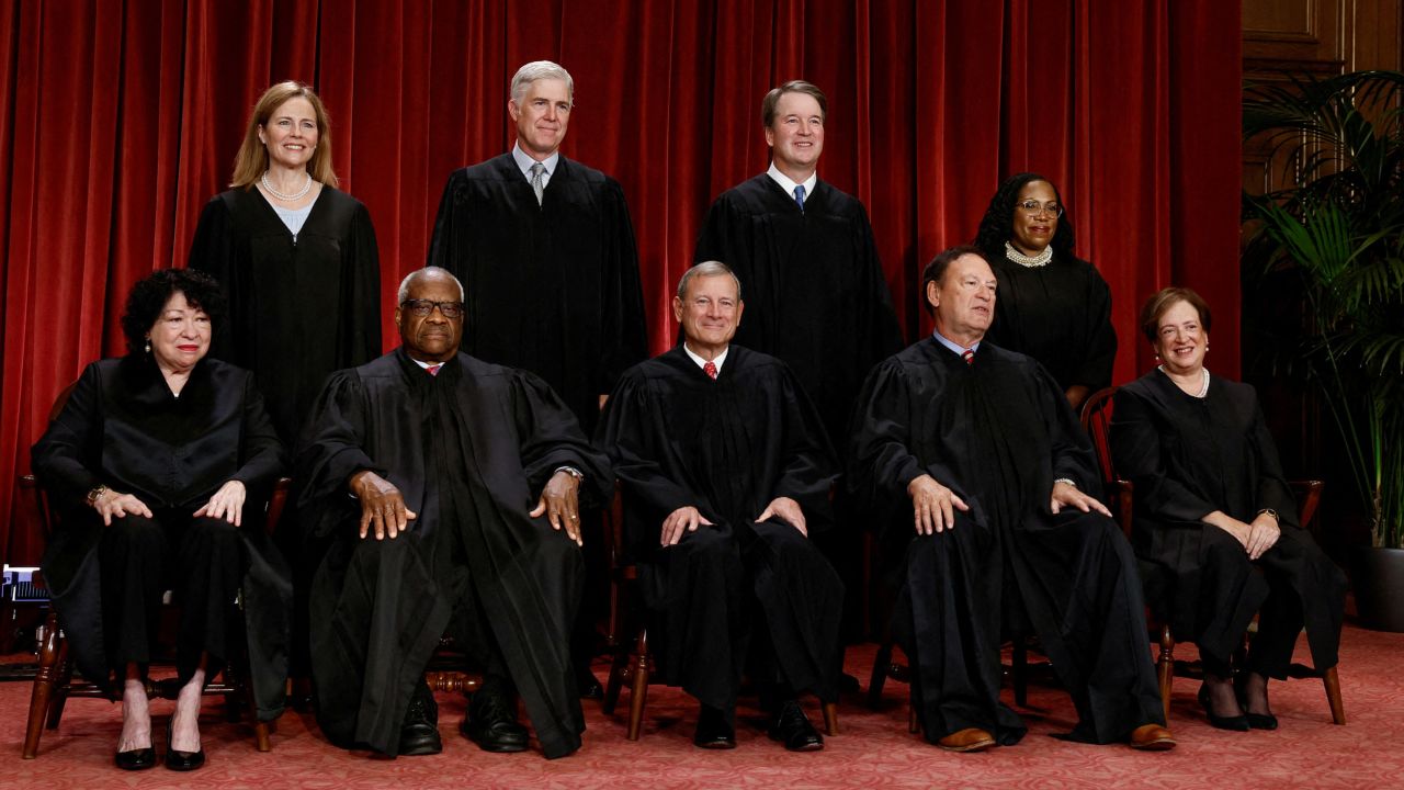 FILE PHOTO: U.S. Supreme Court justices pose for their group portrait at the Supreme Court in Washington, U.S., October 7, 2022. Seated (L-R): Justices Sonia Sotomayor, Clarence Thomas, Chief Justice John G. Roberts, Jr., Samuel A. Alito, Jr. and Elena Kagan. Standing (L-R): Justices Amy Coney Barrett, Neil M. Gorsuch, Brett M. Kavanaugh and Ketanji Brown Jackson. REUTERS/Evelyn Hockstein/File Photo