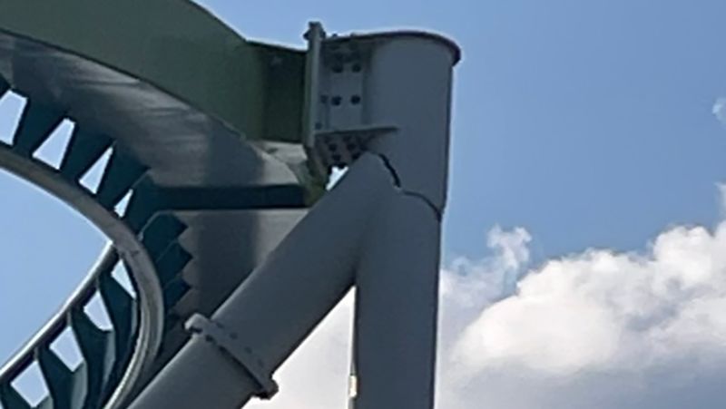 See cracked support pillar sway as roller coaster car goes by