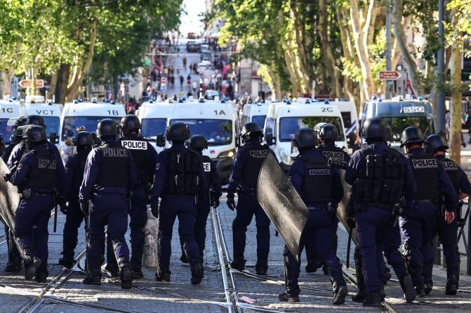 Police officers patrol a demonstration in Marseille, France, on Saturday, July 1.