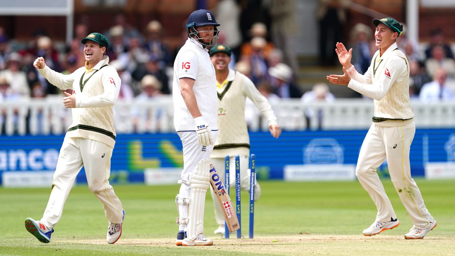 England's Jonny Bairstow (centre) looks frustrated after being run out by Australia's Alex Carey (not pictured) as players celebrate during day five of the second Ashes test match at Lord's, London. Picture date: Sunday July 2, 2023.