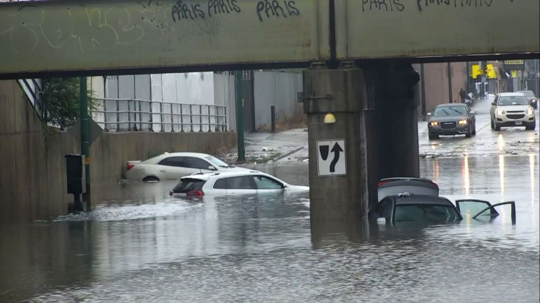Cars are caught in flash flood in Chicago on Saturday, July 2, 2023. 