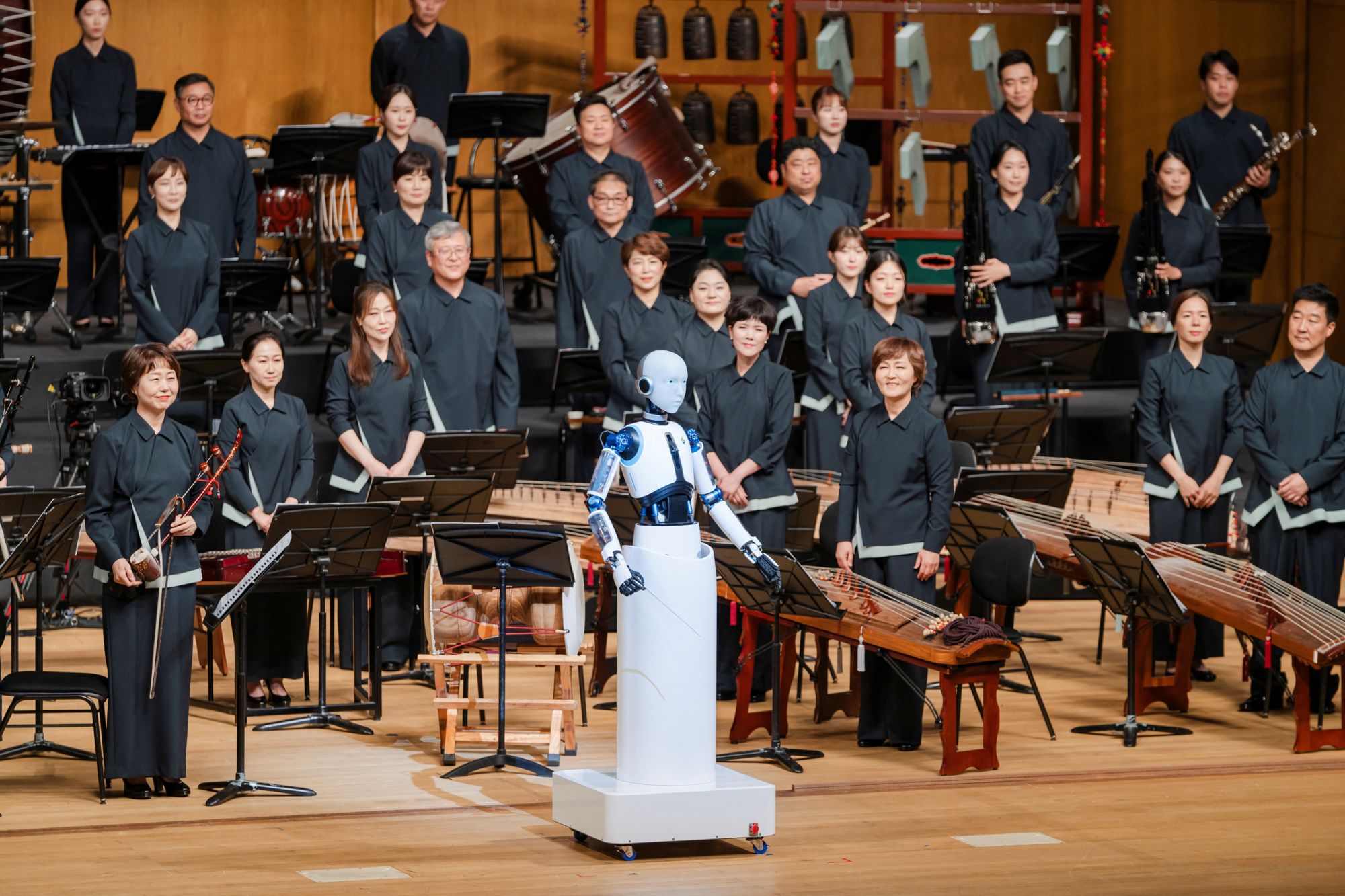 An android robot, EveR 6, takes the conductor's podium to lead a performance by South Korea's national orchestra.