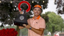 DETROIT, MICHIGAN - JULY 02: Rickie Fowler of the United States poses with the trophy after defeating Adam Hadwin of Canada (not pictured) and Collin Morikawa of the United States (not pictured) in a playoff to win the Rocket Mortgage Classic at Detroit Golf Club on July 02, 2023 in Detroit, Michigan. (Photo by Cliff Hawkins/Getty Images)