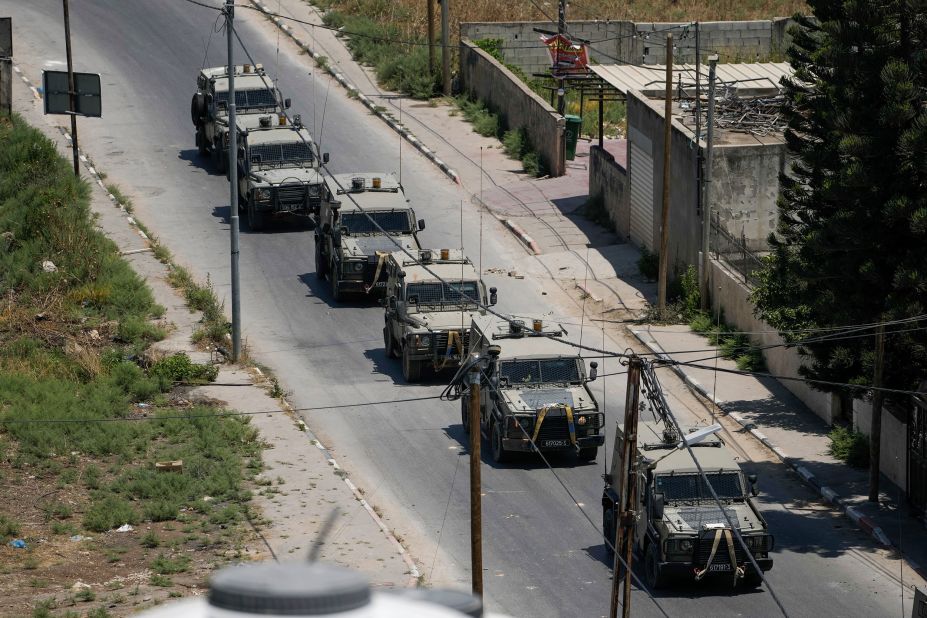 A convoy of Israeli army vehicles is seen during the Israeli raid in Jenin on Monday.