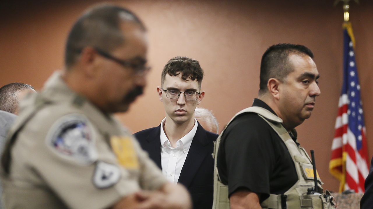 Patrick Crusius, the gunman in the El Paso Walmart shooting, is seen, center, in this file photo from October 2019.