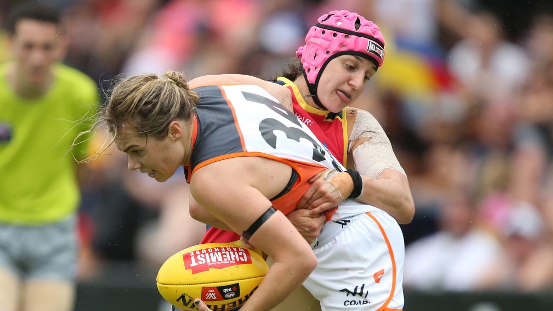 Heather Anderson wore a pink helmet so her vision-impaired mother could see her on the pitch.