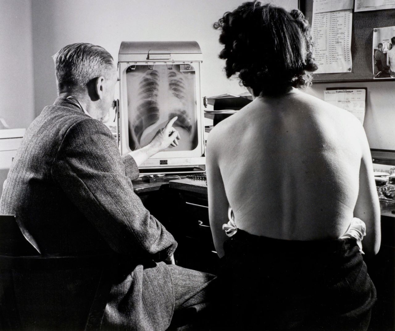 A patient with a chest specialist at a Bristol health centre inspect a chest X-ray in July 1948, the month the NHS launched.