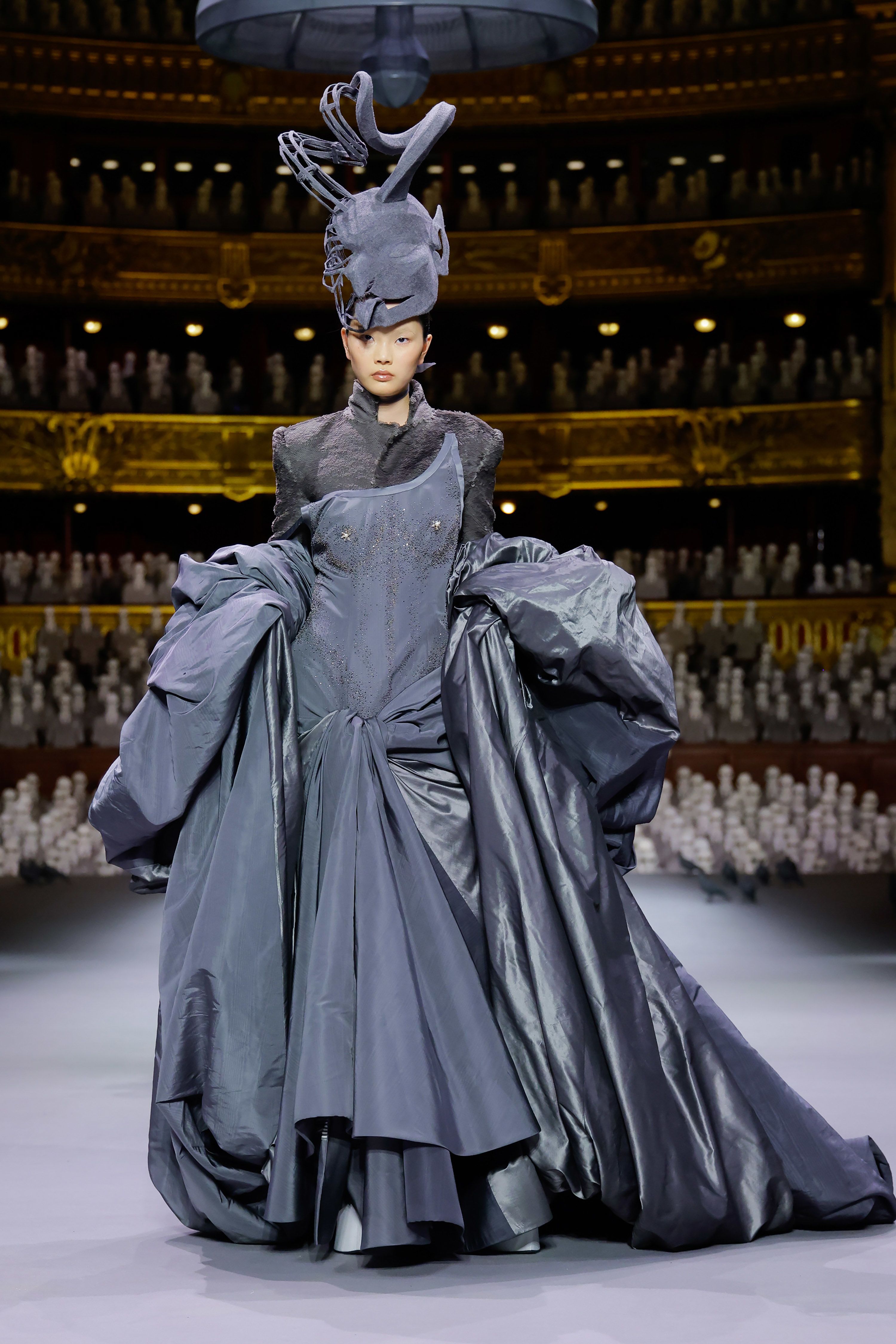 A model represents the architectural gargoyles often seen in train stations.