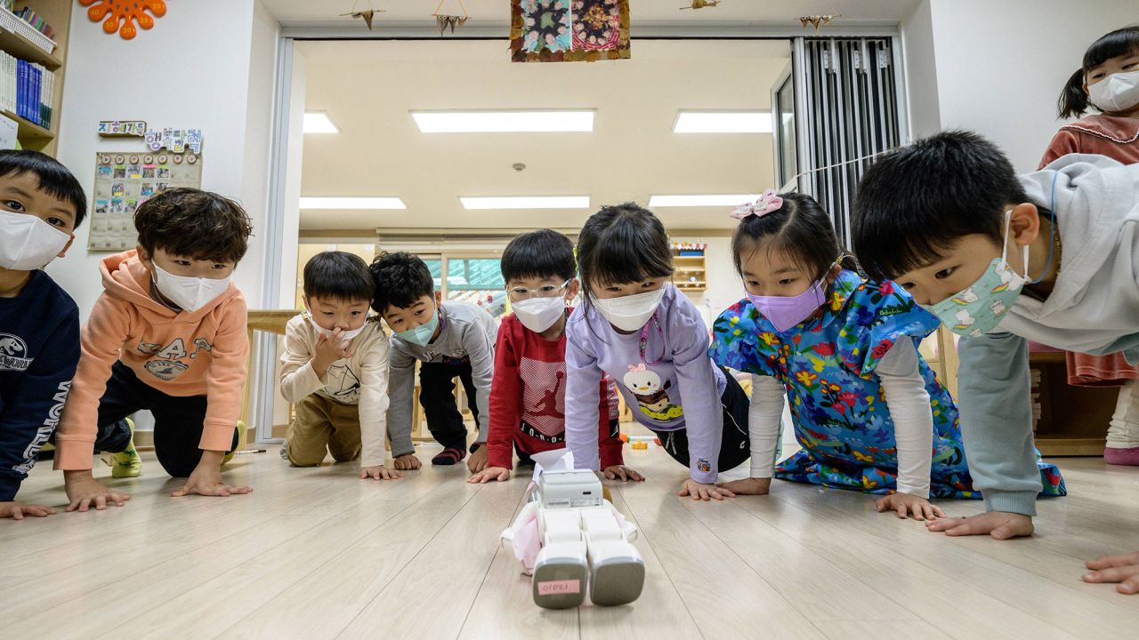 Young students pictured in Seoul, South Korea, on November 23, 2021.