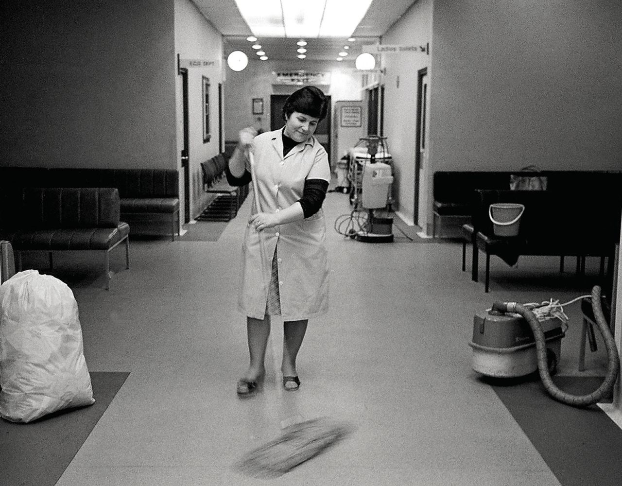 A hospital domestic worker pictured in the 1980s. New book
