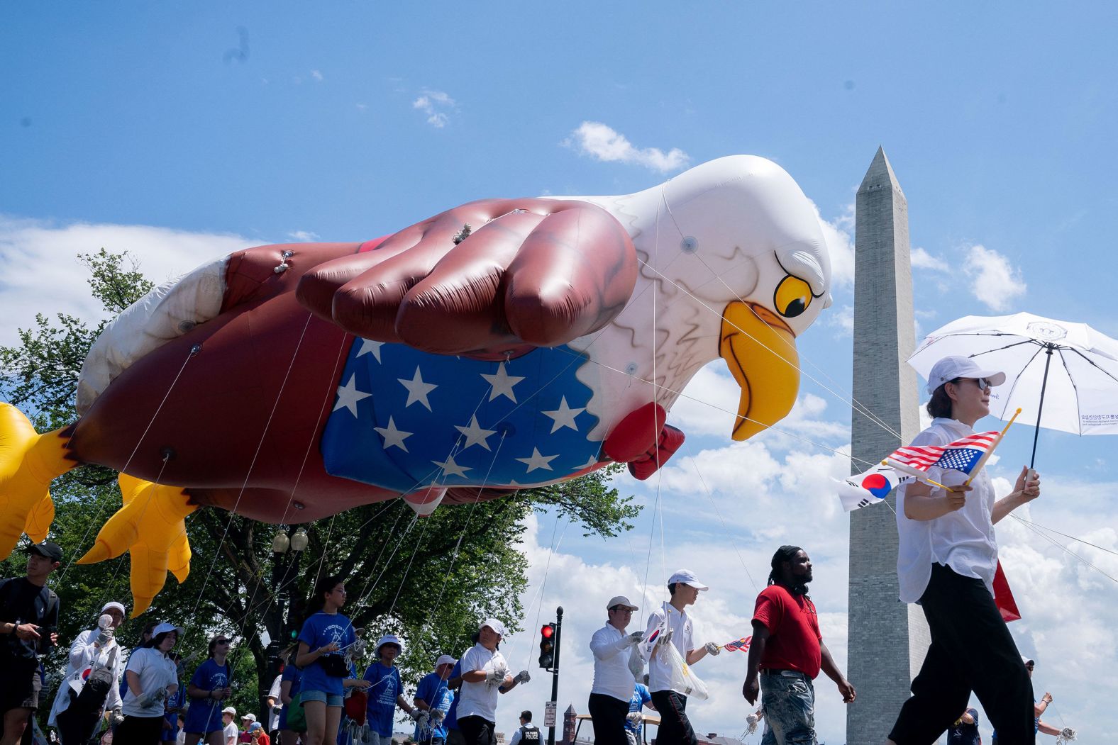 An eagle balloon is flown near the Washington Monument during a parade on Tuesday.