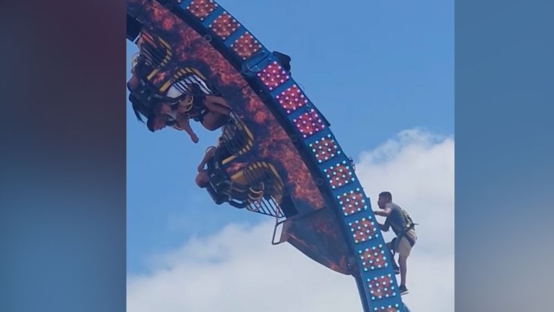 Roller coaster riders trapped upside down for hours until daring rescue | CNN