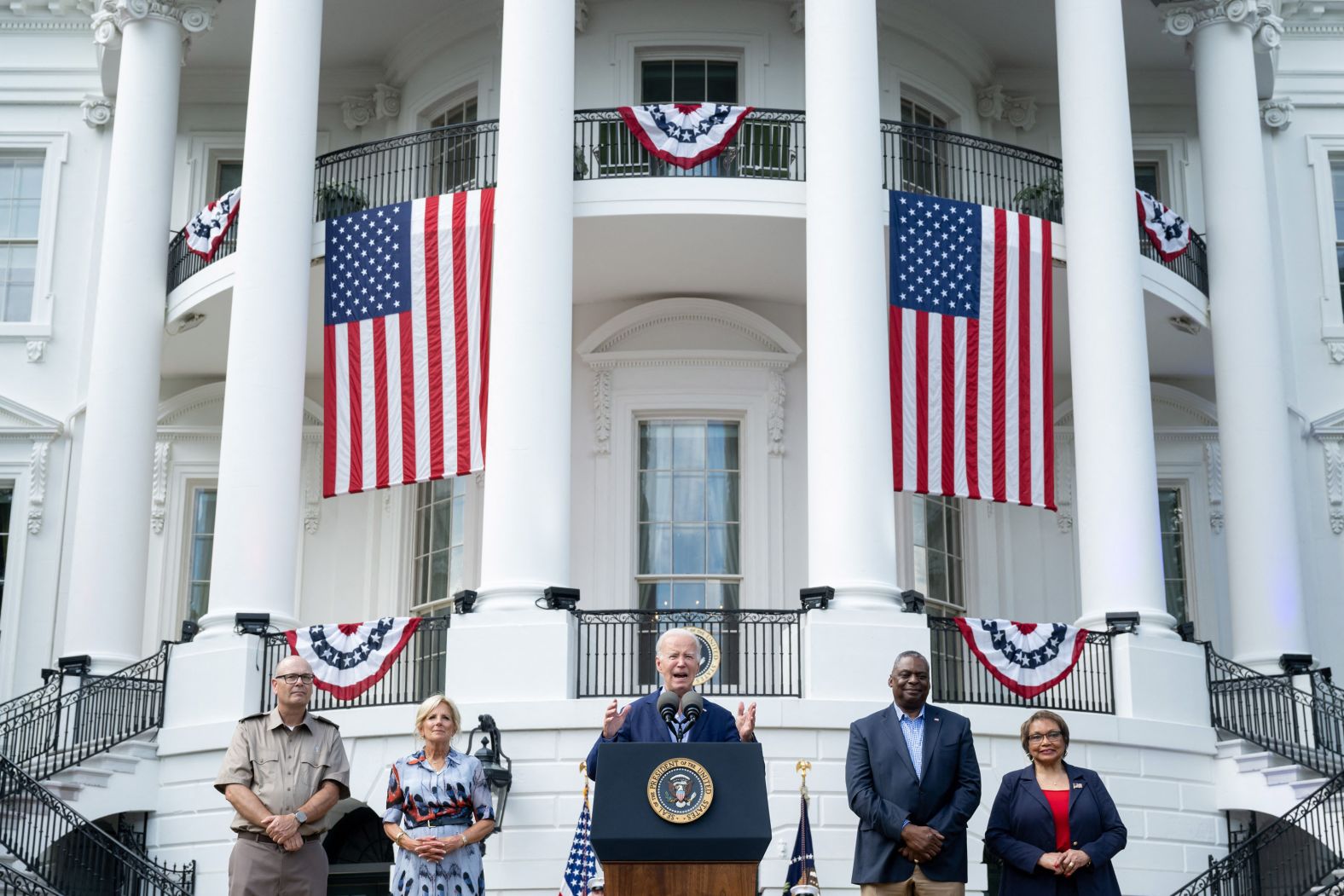 President Joe Biden speaks in front of the White House during a barbecue held for military families on Tuesday.