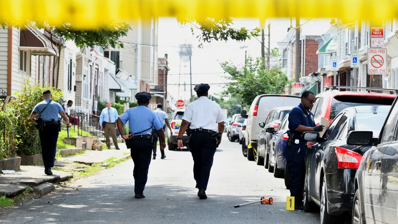 Police officers work at the scene as investigations are ongoing the day after a mass shooting in the Kingsessing section of southwest Philadelphia, Pennsylvania, U.S. July 4, 2023.  REUTERS/Bastiaan Slabbers