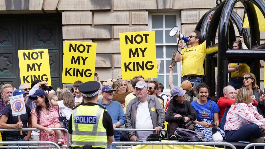 Anti-monarchy protesters gather near St Giles' Cathedral ahead of a National Service of Thanksgiving and Dedication, in Edinburgh on July 5, 2023. Scotland on Wednesday will mark the Coronation of King Charles III and Queen Camilla during a National Service of Thanksgiving and Dedication where the The King will be presented with the Honours of Scotland. (Photo by Danny Lawson / POOL / AFP) (Photo by DANNY LAWSON/POOL/AFP via Getty Images)