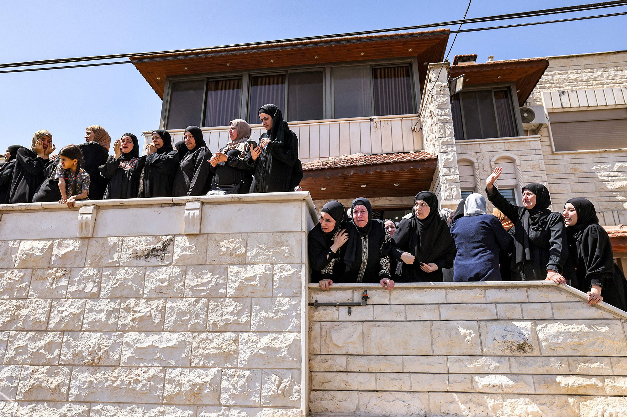 Mourners gather Wednesday during the funeral of a Palestinian who was killed in Jenin.