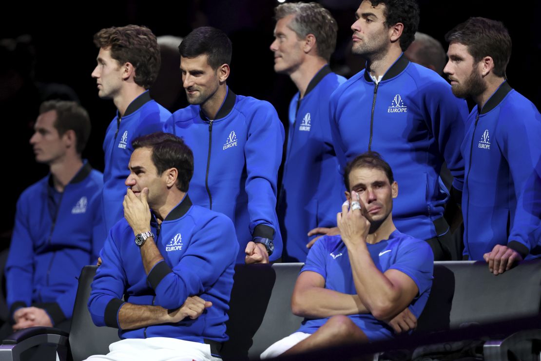 LONDON, ENGLAND - SEPTEMBER 23: Roger Federer of Team Europe shows emotion alongside Rafael Nadal following his final match during Day One of the Laver Cup at The O2 Arena on September 23, 2022 in London, England. (Photo by Julian Finney/Getty Images for Laver Cup)