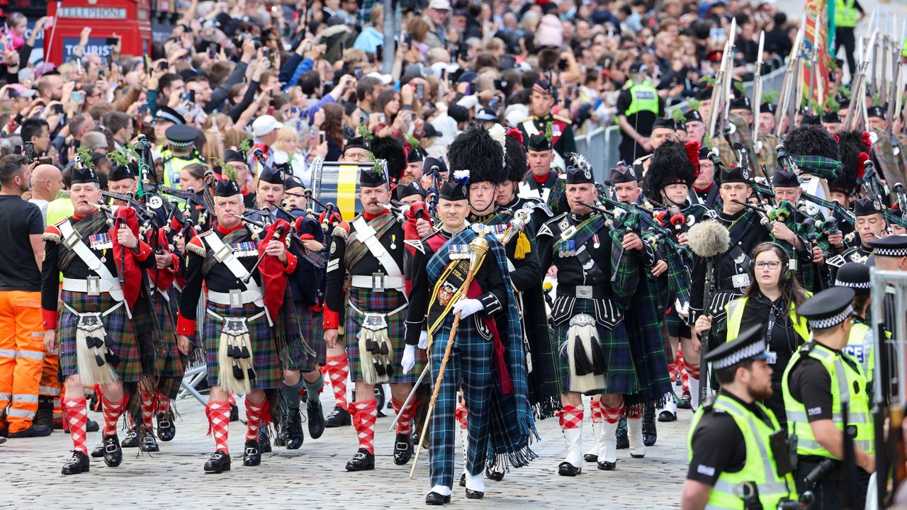 The Combined Cadet Force Pipes and Drums and the Cadet Military Band proceed down Edinburgh's Royal Mile on July 5, 2023.