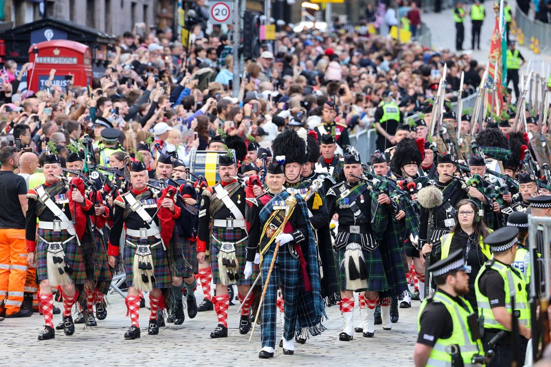 The Combined Cadet Force Pipes and Drums and the Cadet Military Band proceed down Edinburgh's Royal Mile on July 5, 2023.