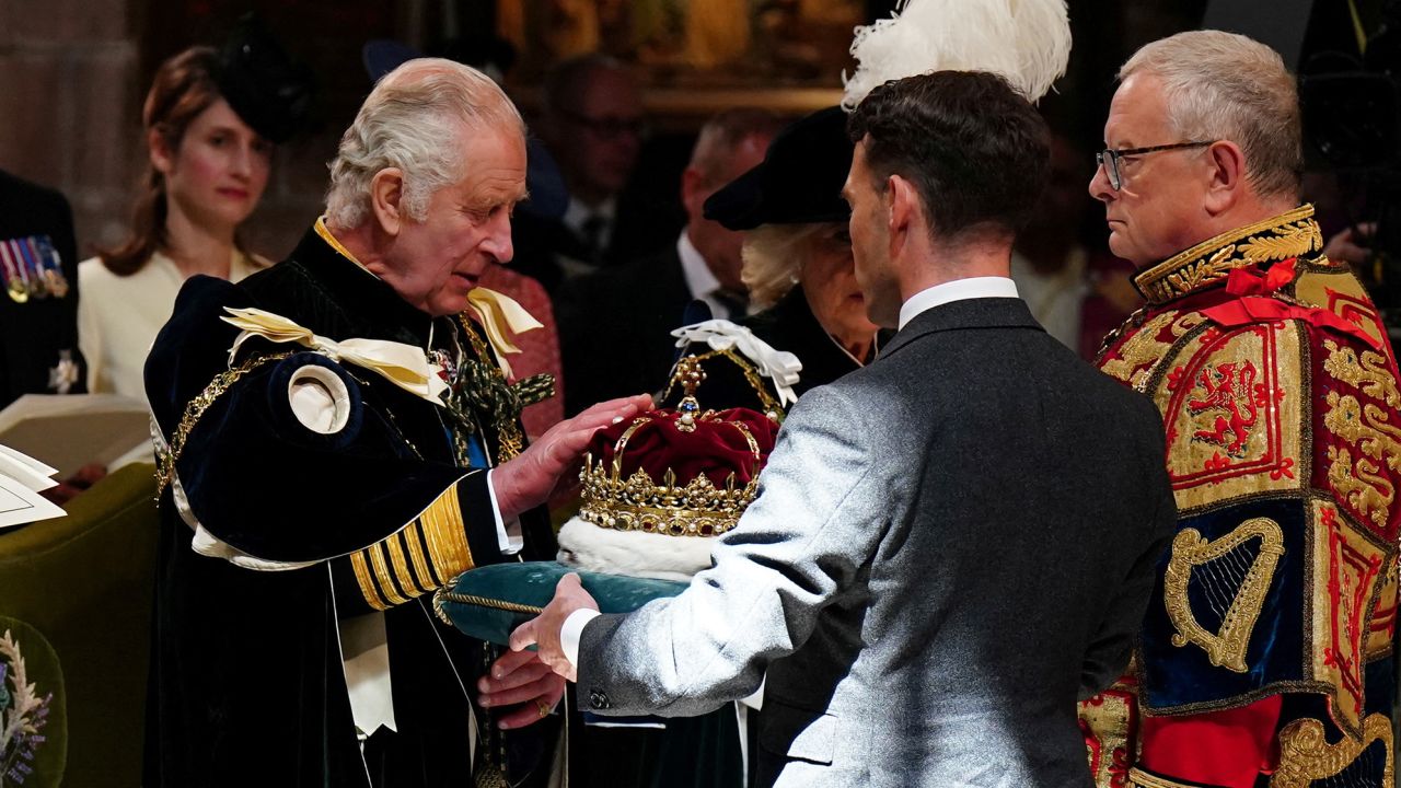 King Charles III is presented with the Crown of Scotland at St. Giles' Cathedral, Edinburgh on July 5, 2023. 