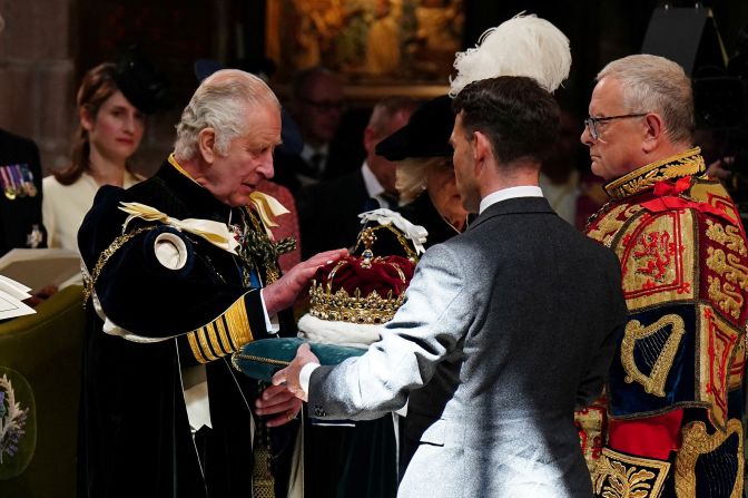 Charles is presented with the Crown of Scotland during a service of thanksgiving that was held at the St. Giles' Cathedral in Edinburgh, Scotland, in July 2023. Scotland was celebrating the King's recent coronation with a <a href="index.php?page=&url=https%3A%2F%2Fwww.cnn.com%2F2023%2F07%2F05%2Feurope%2Fscotland-marks-coronation-charles-royals-gbr-intl%2Findex.html" target="_blank">day of festivities</a>.