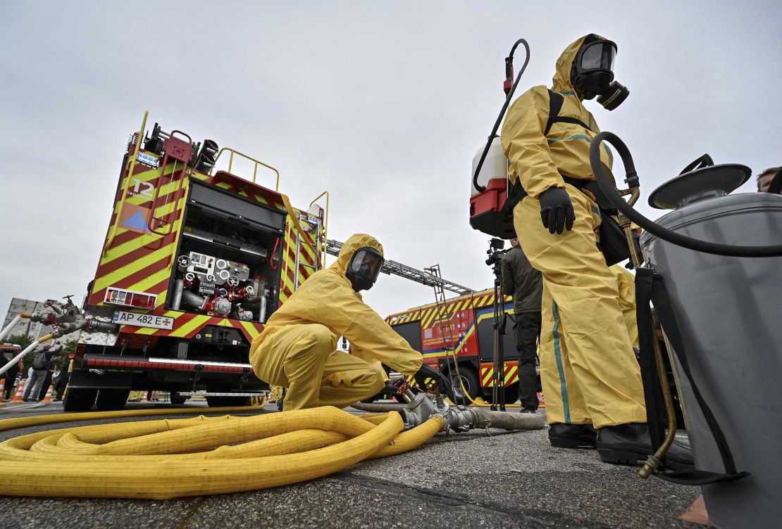 Rescuers attend an anti-radiation drill on June 29, in case of an emergency at the ZNPP.