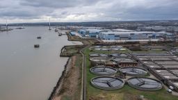 An aerial view shows the Thames Water Long Reach water treatment facility on the banks of the Thames estuary in Dartford, east of London, on March 3, 2023. UK water company Thames Water, one of the UK's largest, has started releasing an interactive map of its waste water discharges into waterways after a beach pollution scandal last summer. 