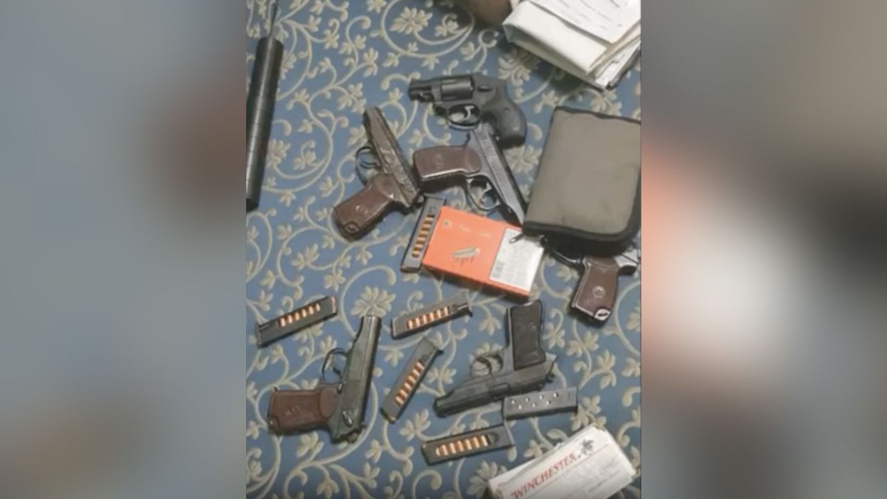 Weapons were reportedly found by police.