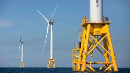 Offshore wind turbines stand near Block Island, Rhode Island, in August 2016. 