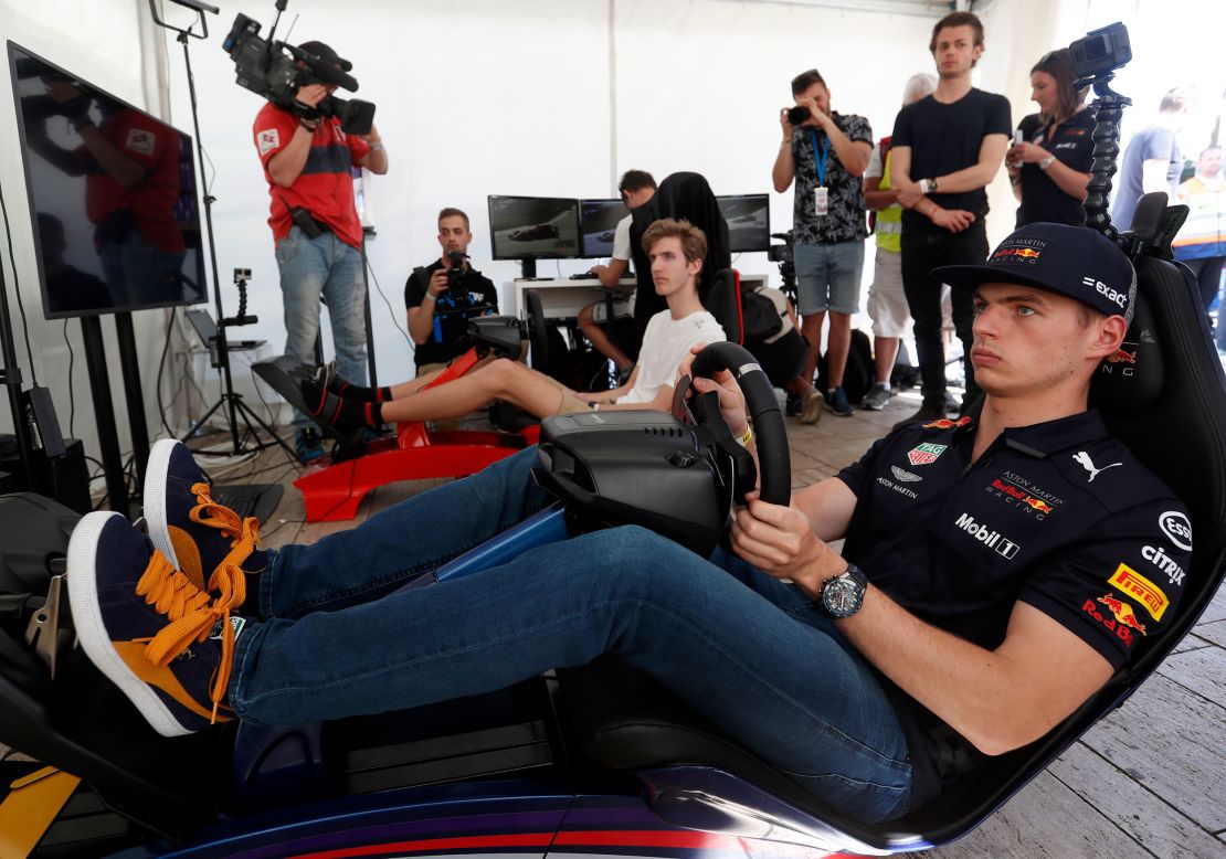 BUDAPEST, HUNGARY - MAY 01: Max Verstappen of Netherlands and Red Bull Racing on a racing simulator during the Red Bull Racing Budapest Showrun on May 1, 2018 in Budapest, Hungary.