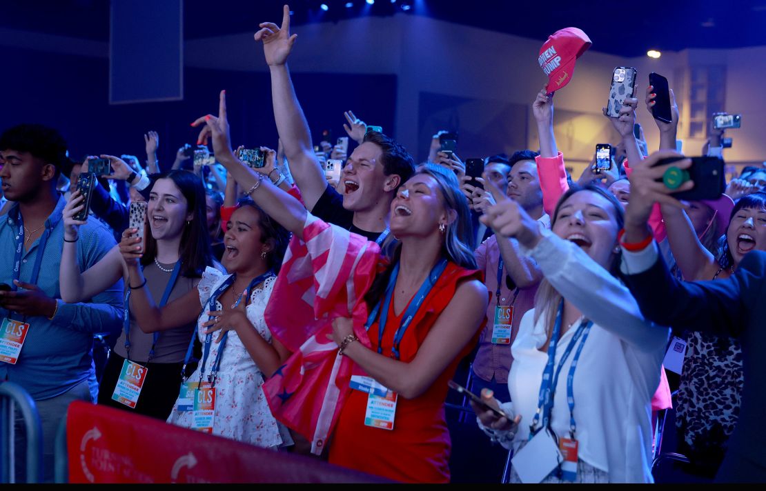 TAMPA, FLORIDA - JULY 23: People cheer as former U.S. President Donald Trump arrives on stage during the Turning Point USA Student Action Summit held at the Tampa Convention Center on July 23, 2022 in Tampa, Florida. The event features student activism, leadership training, and a chance to participate in networking events with political leaders. (Photo by Joe Raedle/Getty Images)