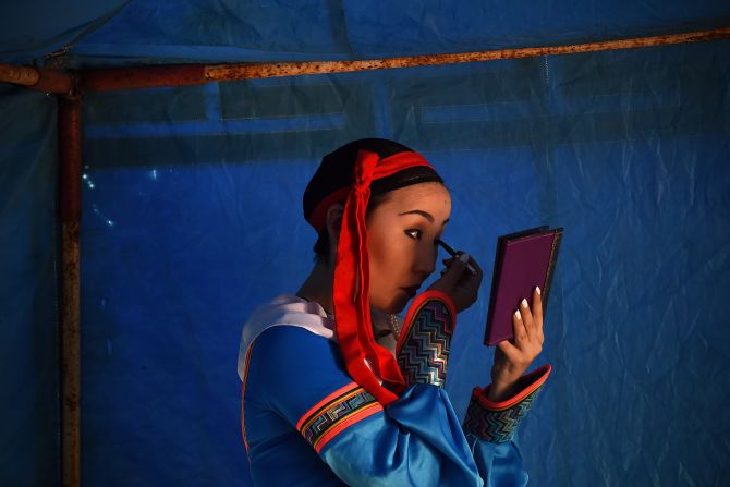 <strong>National pride: </strong>A Mongolian artist prepares to perform on the outskirts of Ulaanbaator in 2016. 