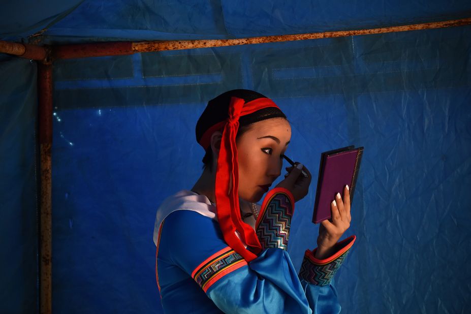 <strong>National pride: </strong>A Mongolian artist prepares to perform on the outskirts of Ulaanbaator in 2016. 